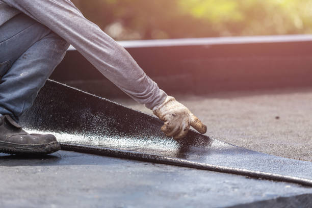 Professional Basement Waterproofing technician working in Logan, OH